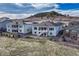 Lovely two-story home with a charming back porch and great backyard space with a hill in the background at 815 Alumroot St, Castle Rock, CO 80104