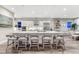 Bright, open kitchen with a large island, granite countertops, and modern appliances at 815 Alumroot St, Castle Rock, CO 80104