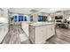 A full kitchen with a granite countertop island and stainless steel appliances at 815 Alumroot St, Castle Rock, CO 80104
