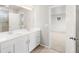 Bathroom featuring double sinks and neutral color palettes at 8840 Sedalia St, Commerce City, CO 80022