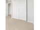 Neutral bedroom with sliding door closet and neutral carpeting at 8840 Sedalia St, Commerce City, CO 80022