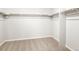 Walk-in closet with ample storage space and neutral carpeting at 8840 Sedalia St, Commerce City, CO 80022
