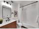 Stylish bathroom boasting a contemporary vanity, updated fixtures, and a shower-tub combo at 11985 E Harvard Ave # 108, Aurora, CO 80014