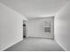 Bright bedroom offers neutral carpet, a window, and a closet for ample storage at 11985 E Harvard Ave # 108, Aurora, CO 80014