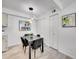 Cozy dining area with modern lighting and minimalist wall art at 11985 E Harvard Ave # 108, Aurora, CO 80014