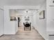 Bright dining area next to kitchen and featuring modern pendant lighting at 11985 E Harvard Ave # 108, Aurora, CO 80014