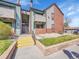 Attractive condo with brick accents, multiple balconies and nicely landscaped grounds at 11985 E Harvard Ave # 108, Aurora, CO 80014