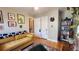 Cozy bedroom featuring a comfy sofa and built-in shelving at 1303 Newport St, Denver, CO 80220
