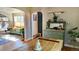 Bright dining room adjacent to the living area and kitchen at 1303 Newport St, Denver, CO 80220
