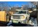 Driveway with a truck parked near a wooden fence and a house in the background at 1303 Newport St, Denver, CO 80220