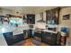 Modern kitchen with white subway tile backsplash and stainless steel appliances at 1303 Newport St, Denver, CO 80220