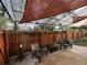 Cozy patio with covered seating area and string lights at 1303 Newport St, Denver, CO 80220