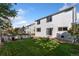 Spacious backyard with a patio, well-maintained lawn, and privacy fence, perfect for outdoor activities and relaxation at 22142 E Belleview Place, Aurora, CO 80015
