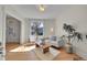 Inviting living room with hardwood floors, stylish decor, and lots of natural light at 169 W Byers Pl, Denver, CO 80223