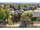 Aerial view of a home with a well-manicured lawn and established neighborhood at 11373 Kearney Way, Thornton, CO 80233