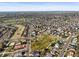 A vibrant community park with walking trails, a basketball court, and a playground at 11373 Kearney Way, Thornton, CO 80233