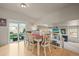 Bright dining area adjacent to the kitchen with a view of the backyard and an open floor plan at 11373 Kearney Way, Thornton, CO 80233