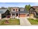 Charming two-story home with landscaped front yard and inviting curb appeal at 11373 Kearney Way, Thornton, CO 80233