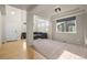 Spacious living room with soaring ceilings, large windows, and a comfortable seating area at 11373 Kearney Way, Thornton, CO 80233