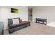 View of loft space with a seating area and piano, creating a versatile and comfortable living area at 11373 Kearney Way, Thornton, CO 80233