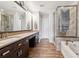 Spacious bathroom features double sinks, a soaking tub, and a separate shower at 1466 Turnberry Dr, Castle Rock, CO 80104