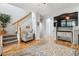 Cozy living space with staircase, seamlessly blending comfort and style at 1466 Turnberry Dr, Castle Rock, CO 80104