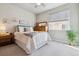 Cozy bedroom with a large window and neutral tones providing a calming atmosphere at 6737 S Tempe Ct, Aurora, CO 80016