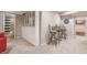 Finished basement with seating for dining or games, and storage at 12616 Jersey W Cir, Brighton, CO 80602
