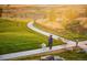 Scenic community walking path, perfect for enjoying the outdoors and staying active at 21166 E 62Nd Dr, Aurora, CO 80019