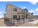 Stylish townhouse showcasing a well-maintained facade with stone accents and private entrance at 503 S Rollie Ave # 12D, Fort Lupton, CO 80621