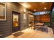 View of the rear patio area featuring recessed lighting, outdoor furniture, and privacy fence at 2669 N Cherry St, Denver, CO 80207