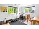Functional exercise space with great natural light, fitness equipment, and wood floors at 2669 N Cherry St, Denver, CO 80207