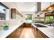 Gourmet kitchen with sleek countertops, stainless steel appliances, and custom cabinetry at 2669 N Cherry St, Denver, CO 80207