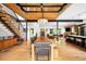 Bright open-concept living space featuring a dining area, modern kitchen, and cozy living room at 2669 N Cherry St, Denver, CO 80207