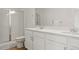 Bathroom features a double sink vanity and glass enclosed shower at 22863 E Tufts Ave # A, Aurora, CO 80015