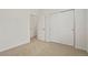 A spacious bedroom featuring ample closet space and lots of light at 22863 E Tufts Ave # A, Aurora, CO 80015