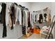 Walk-in closet with ample storage space and organization, ready to hold your wardrobe at 22863 E Tufts Ave # A, Aurora, CO 80015