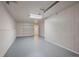 Clean, minimalist garage space with shelving for storage and easy organization at 29691 Fairway Dr, Evergreen, CO 80439