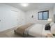 Bedroom with closet and a large window providing plenty of natural light at 21482 E Idyllwilde Dr, Parker, CO 80138