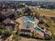 An aerial view of the community pool with cabanas and a slide for residents at 21482 E Idyllwilde Dr, Parker, CO 80138