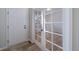 Bright entryway with white doors and glass paneled doors leading to another room, creating an open and inviting space at 21482 E Idyllwilde Dr, Parker, CO 80138