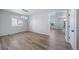 Spacious living room features wood floors, ample natural light, and neutral wall color, perfect for comfortable living at 21482 E Idyllwilde Dr, Parker, CO 80138