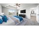 Main bedroom suite with tray ceiling, en-suite bathroom and an abundance of natural light at 21482 E Idyllwilde Dr, Parker, CO 80138