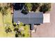 Aerial view of the home showcasing the roof and surrounding yard at 17800 E Hinsdale Ave, Foxfield, CO 80016