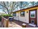 Backyard deck with an outdoor seating area, perfect for entertaining at 17800 E Hinsdale Ave, Foxfield, CO 80016