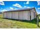 Large barn featuring multiple sliding doors for easy access at 17800 E Hinsdale Ave, Foxfield, CO 80016