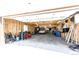 Spacious garage with ample storage and workspace at 17800 E Hinsdale Ave, Foxfield, CO 80016