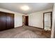Spacious main bedroom with an en-suite bathroom and closet at 17800 E Hinsdale Ave, Foxfield, CO 80016
