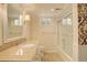 Bathroom featuring a vanity and shower-tub at 3127 And 3125 N Raleigh St, Denver, CO 80212