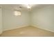 Bedroom with window and neutral walls at 3127 And 3125 N Raleigh St, Denver, CO 80212